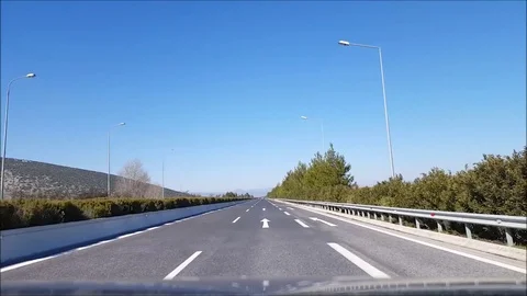 Driving car on empty highway Stock Footage 73253177