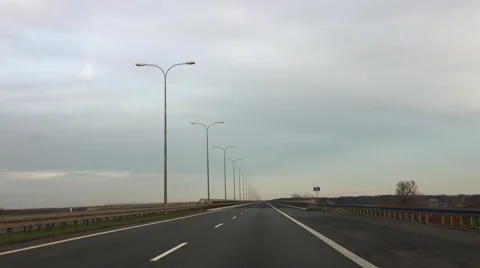 Driving a car on empty highway. Front view, POV. Vídeo Stock 68028820