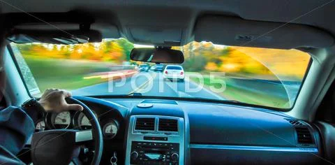Driving in car in fall Stock Photos