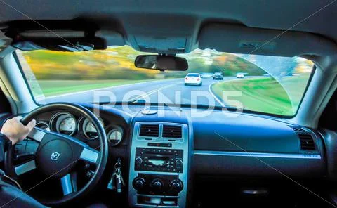 Driving in car in fall Stock Photos