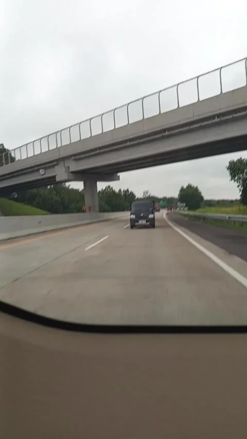 Driving a car on a freeway Stock Footage 300652715