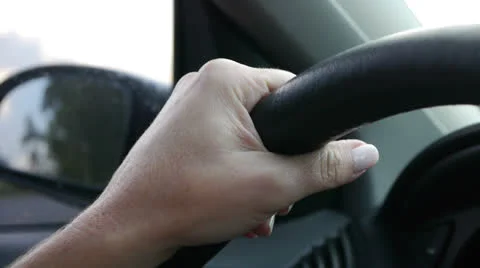 Driving a car on the freeway. Hands on the steering wheel. Stock Footage 23448674