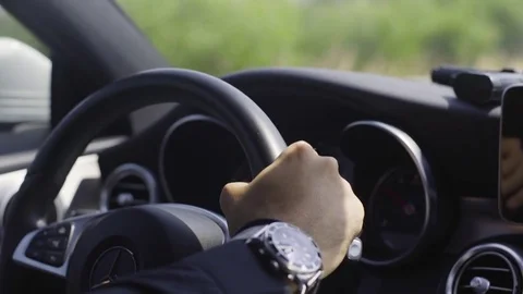 Driving A Car On The Freeway. Hands On The Steering Wheel. Gun On The Dashboard. Stock Footage