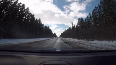 Driving on a car in good sunny winter weather Stock Footage