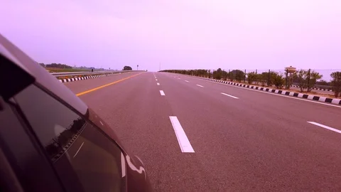 Driving a car on a highway Stock Footage 104657066