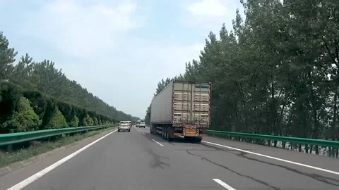 Driving a car on the highway Stock Footage 153657710