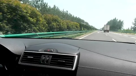Driving a car on the highway Stock Footage 153658393