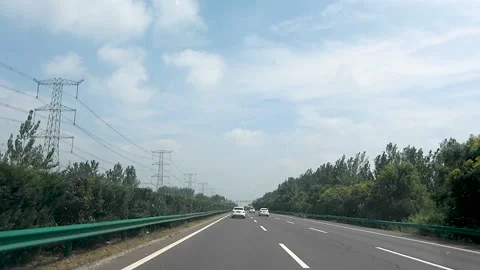 Driving a car on the highway Stock Footage 153659461