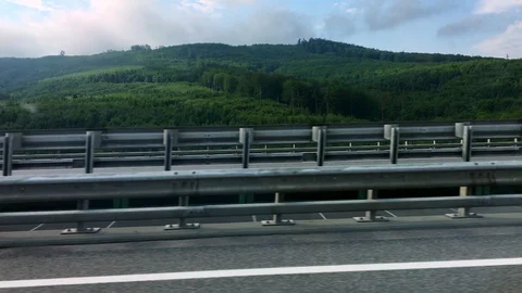 Driving with car on highway, look to the side, view from bridge, driver's view Stock Footage 109403564