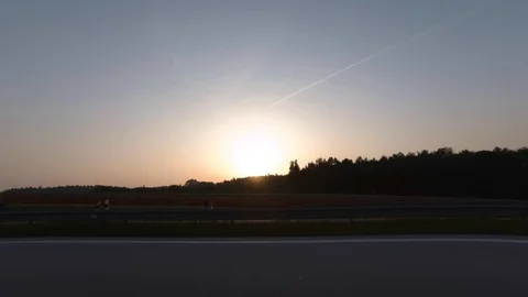 Driving with car on highway, sunset, driver view to the side Stock Footage 110905907