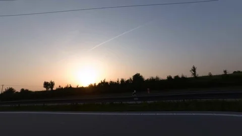 Driving with car on highway, sunset, driver view to the side Stock Footage 110958293