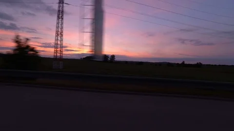 Driving with car on highway, sunset, driver view to the side Stock Footage 110990878