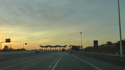 Driving car in highway at sunset Stock Footage 34736848