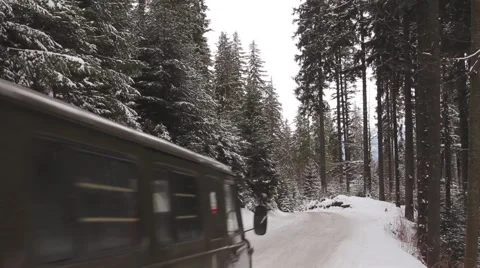 Driving a car on a mountainous snow-covered serpentine. kstremal journey by car Stock Footage 59159090