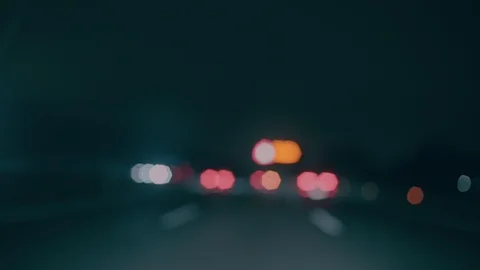 Driving car at night time and rain Stock Footage 102739656