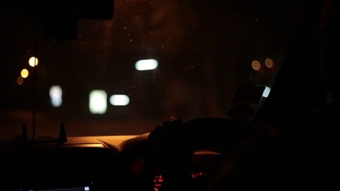 Driving a car at night.ride in the road Light circle bokeh of road at night. Stock Footage
