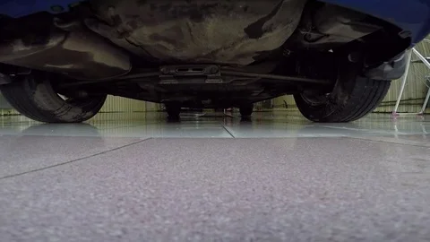 Driving the car over the camera Stock Footage 79782389