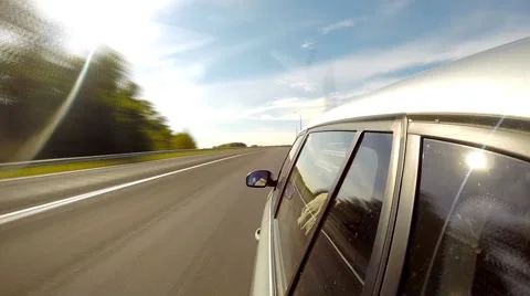 Driving a car on the overpass. The camera is left outside. Timelapse Stock Footage 42616187