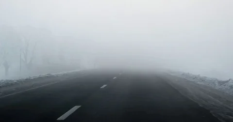 Driving Car Point of View on Winter Morning Foggy Road With Sun at the Sky Car Stock Footage 72175522
