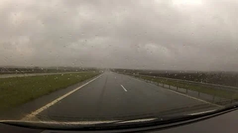 Driving a car in the rain. Stock Footage 12317196
