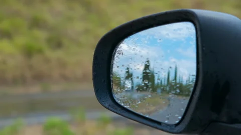 Driving car in the rain, overtaking another vehicle Stock Footage 321598079