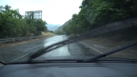 Car Window Rain Stock Footage ~ Royalty Free Stock Videos