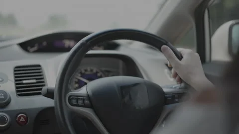 Driving a car on the road Stock Footage 305425383