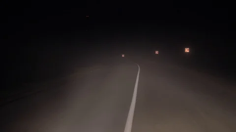 In Driving A Car On Road At Night In Heavy Fog And Poor Visibility On The Turn Stock Footage