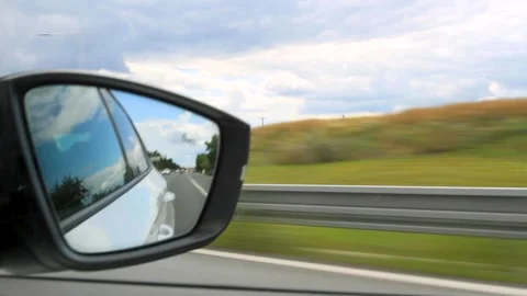 Driving a car on a road at speed . Stock Footage 135053157