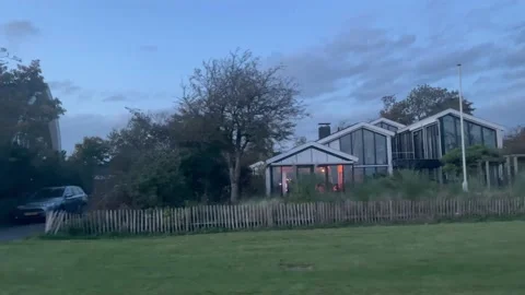 Driving Car Side View Through Neighbourhood Motion Stock Footage 219641794