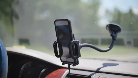 Driving in Car with Smart Phone GPS and Traffic in Slow Motion  Stock Footage 72394835