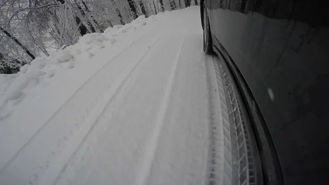 Driving car in snow Stock Footage 82365978