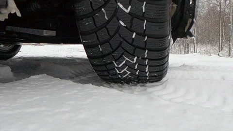 Driving a car on snow Stock Footage 146447785