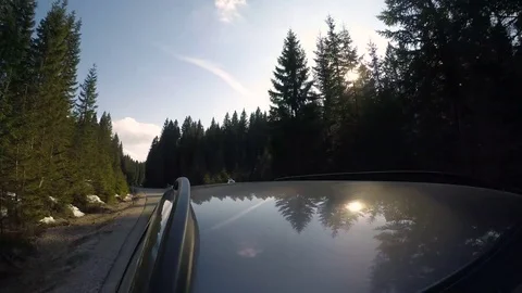 Driving car at sunset Stock Footage 74119377