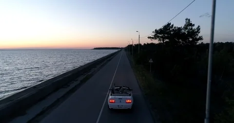 Driving car at sunset Stock Footage 91064826