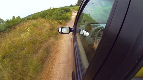 Driving a car through the countryside Stock Footage 29285795