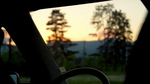 Driving car through landscape at sunset Stock-Footage 342282499