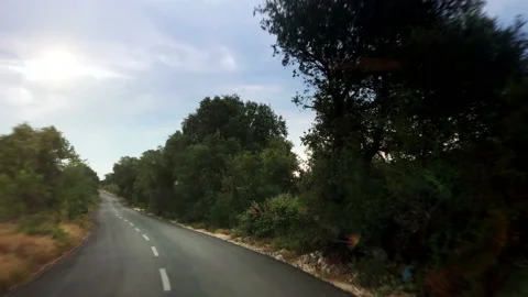Driving a car through a mountain road Stock Footage 115197232