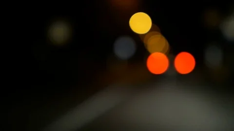 Driving a car through night road, highway. Defocused lights Los Angeles stree Stock-Footage 82481328