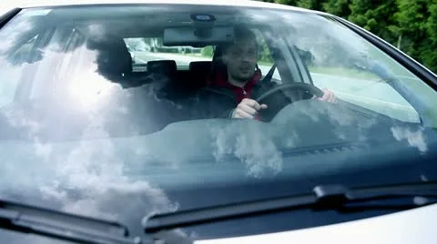 Driving car while cloudscape reflection on windshield Video stock 28962076
