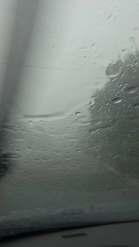 Driving car windshield wipers clearing heavy rain Stock Footage 338408986