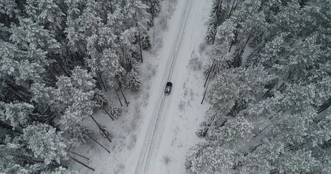 Driving car on winter road Stock Footage 101090845
