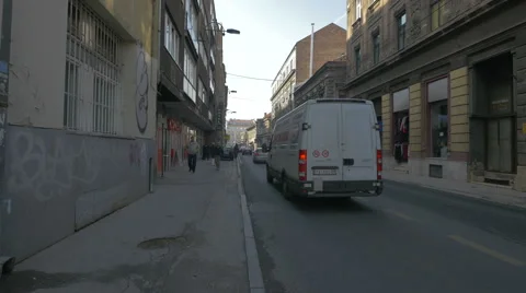 Driving cars and walking on Mula Mustafe Baseskije in Sarajevo Stock Footage 59794777