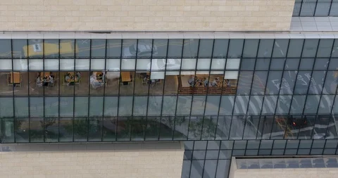 Driving cars's reflection on glasses surface of shopping mall building Stock Footage 93681202