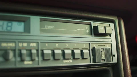 Driving a classic retro car through the 80s with vintage music experience Stock Footage 320033159
