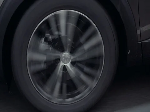 Driving close up SUV sport car rims Stock Footage