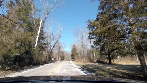 Driving county road in rural area in winter with snow on the ground Stock Footage 281694728