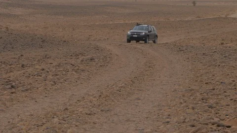 Driving Dacia duster in Erg Chegaga desert, Morocco, Africa in 4K Stock Footage 92108744