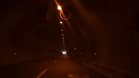 Driving in dark Tunnel Stock Footage 53321374