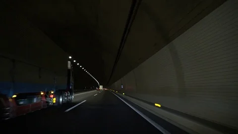 Driving in the dark tunnel Stock Footage 81115785